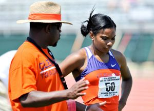 Head Coach Lawrence Johnson and April Sinkler