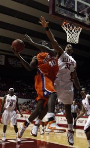 Clemson's James Mays goes up for a shot around Alabama defender Richard Hendrix in the first half.