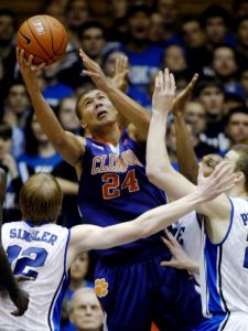 Clemson's Milton Jennings (24) reaches for a pass over Duke's Kyle Singler (12) and Miles Plumlee.
