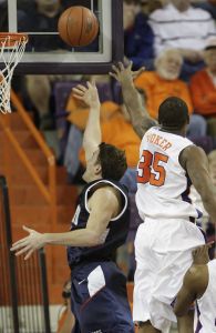 Clemson's Trevor Booker, right, tries to block the shot of Samford's Joe Ross Merritt during the second half of the baketball game in Clemson, S.C., Saturday, Dec. 29, 2007. Clemson won, 78-45. (AP Photo/Patrick Collard)