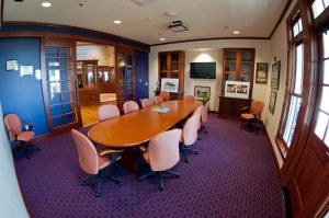 Wide angle photos of the interior rooms of the Penley Golf Facility