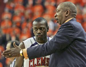 Andre Young listens to instruction from Head Coach Oliver Purnell during the second half.