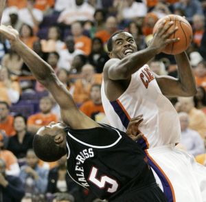 Clemson's K.C. Rivers drives for the basket as South Carolina's Brandis Raley-Ross tries to block the shot during the second half.