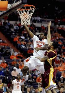 Clemson's Trevor Booker (35) drives to the basket against Winthrop's Matt Morgan, right, during the first half of an NCAA college basketball game Monday, Nov. 23, 2009, in Clemson, S.C. (AP Photo/Richard Shiro)