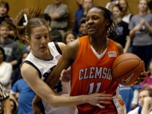 Duke's Abby Waner, left, tries to steal a ball from Clemson's Lele Hardy (11) in the second half of a basketball game in Durham, N.C., on Monday, Feb. 5, 2007. Duke won 105-53 over Clemson. (AP Photo/Sara D. Davis)