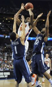 Clemson center Trevor Booker shoots over Villanova's Scottie Reynolds and Dwayne Anderson during the first half. (AP Photo/Steve Nesius)