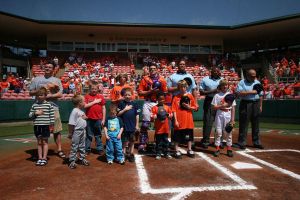 Kids on field during National Anthem