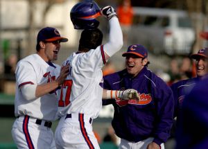 Steve Wilkerson celebrate game winning hit in bottom of ninth with Joe Costigan and Dominic Attanasio