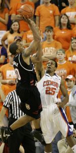 Clemson's Cliff Hammond tries to block South Carolina's Zam Fredrick during the first half.