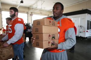 Members of the Clemson football team spent the morning of Monday, December 20 volunteering at Harvest Hope Food Bank in Greenville.
