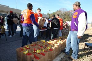 Members of the Clemson football team spent the morning of Monday, December 20 volunteering at Harvest Hope Food Bank in Greenville.