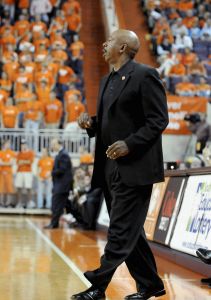 Clemson coach Oliver Purnell, foreground, and Winthrop coach Randy Peele, background, work the sidelines during the first half of an NCAA college basketball game Monday, Nov. 23, 2009, at Littlejohn Coliseum in Clemson, S.C. (AP Photo/Richard Shiro)