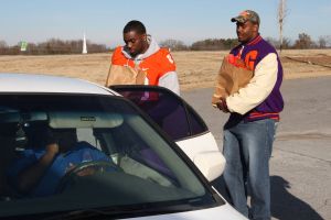 Members of the Clemson football team spent the morning of Monday, December 20 volunteering at Harvest Hope Food Bank in Greenville.