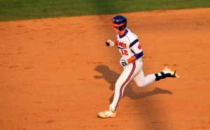 Jon McGibbon rounds the bases after hitting a three-run walkoff home run in the ninth inning on Friday against Florida State.