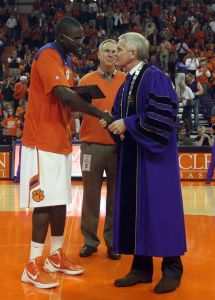 Bryan Narcisse, President James F. Barker, diploma