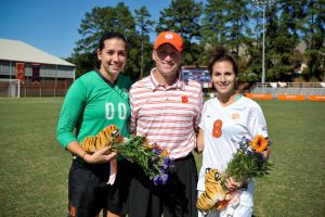 Seniors Marci Elpers and Samantha Fortier with Head Coach Hershey Strosberg