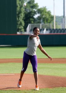 April Sinkler women's track and field acc mvp throw out first pitch