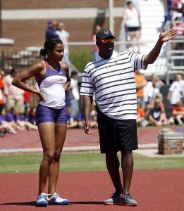April Sinkler and Director of Track & Field Lawrence Johnson