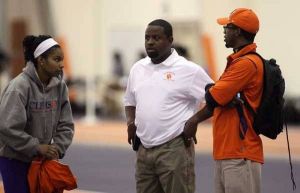 Head Coach Lawrence Johnson, Assistant Coach Mario Wilson and April Sinkler
