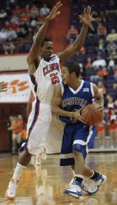 Clemson's Cliff Hammonds puts pressure of Presbyterian's Pierre Miller during the first half.
