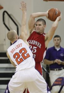Terrence Oglesby tries to block the pass of Gardner-Webb's Nate Blank during the second half. (AP Photo/Patrick Collard)