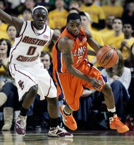 Clemson's Demontez Stitt, right, heads upcourt in front of Boston College's Reggie Jackson in the first half of an NCAA college basketball game Tuesday, Feb 10, 2009, in Boston. Clemson won 87-77. (AP Photo/Michael Dwyer)