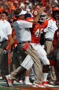 Defensive Coordinator Kevin Steele and Jonathan 
