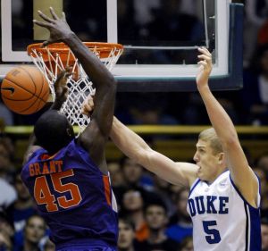 Duke's Mason Plumlee (5) blocks Clemson's Jerai Grant.