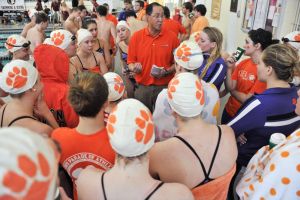 Head Coach Chris Ip team huddle