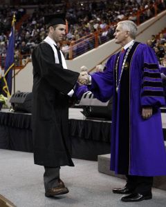 graduation 121610 mark smith baseball manager