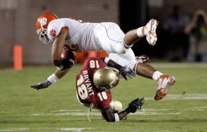 Clemson receiver Durrell Barry, top, runs over Florida State defender J. R. Bryant after a reception during the second quarter of an NCAA football game, Saturday, Sept. 16, 2006, in Tallahassee, Fla.(AP Photo/Phil Coale)