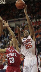 Cliff Hammonds shoots against North Carolina State's Marques Johnson during the second half of their basketball game in Clemson, S.C., Tuesday, Jan. 15, 2008. Hammonds led Clemson with 14 points in the 70-54 victory. (AP Photo/Patrick Collard)