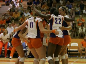 team celebrate on court