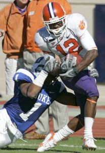 Marcus Gilchrist is tackled by Duke's Jabari Marshall during the second half. (AP Photo/Gerry Broome)