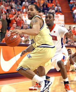 Georgia Tech's Maurice Miller, left, turns away from Clemson's Demontez Stitt during the first half of an NCAA college basketball game on Tuesday, March 2, 2010 at Littlejohn Coliseum in Clemson, S.C. (AP Photo/Anderson Independent-Mail, Mark Crammer)