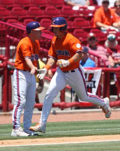 Jason Stolz and Head Coach Jack Leggett congratulates Stolz