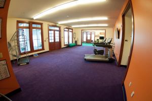 Wide angle photos of the interior rooms of the Penley Golf Facility
