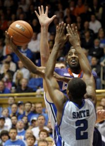Clemson's Demontez Stitt, center, splits Duke's Nolan Smith (2) and Brian Zoubek.