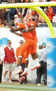 Jacoby Ford and Aaron Kelly celebrate
