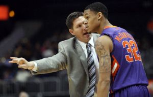 Head Coach Brad Brownell and K.J. McDaniels