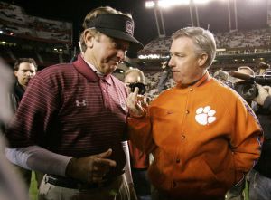 Clemson coach Tommy Bowden, right,talks with South Carolina coach Steve Spurrier before the start of their college football game Saturday, Nov. 24, 2007, at Williams- Brice Stadium in Columbia, S.C. (AP Photo/Mary Ann Chastain)