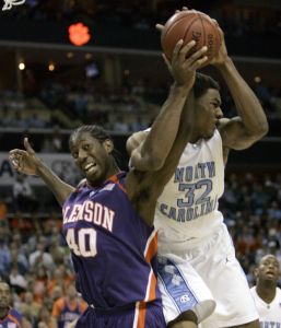 James Mays and North Carolina's Alex Stepheson battle for a rebound. (AP Photo/Gerry Broome)
