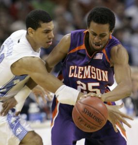 Cliff Hammonds fights North Carolina's Danny Green for the ball. (AP Photo/Gerry Broome)