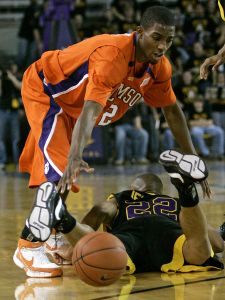 Demontez Stitt (2) tries to control the ball as East Carolina's Darrell Jenkins (22) falls to the floor during the first half of a college basketball game in Greenville, N.C., Wednesday, Dec. 5, 2007. (AP Photo/Gerry Broome)