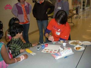 Members of the Solid Orange Squad volunteered at the Clemson Elementary International Festival on February 21.