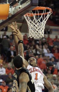 K.C. Rivers shoots against Wake Forest's James Johnson during the first half of the baketball game in Clemson, S.C., Tuesday, Jan. 22, 2007. Rivers scored 19 points and Clemson won in overtime 80-75. (AP Photo/Patrick Collard)