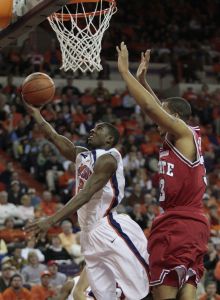 Demontz Stitt shoots against North Carolina State's Brandon Costner during the first half of their baketball game in Clemson, S.C., Tuesday, Jan. 15, 2008. (AP Photo/Patrick Collard)