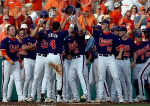 John Hinson homerun celebrate team at the plate