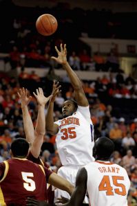 Clemson's Trevor Booker (35) shoots over teammate Jerai Grant (45) and Winthrop's Matt Morgan (5) during the first half of an NCAA college basketball game Monday, Nov. 23, 2009, in Clemson, S.C. (AP Photo/Richard Shiro)
