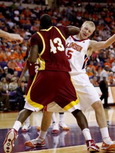 Winthrop's George Valentine (43) elbows Clemson's Tanner Smith (5) during the first half of an NCAA college basketball game Monday, Nov. 23, 2009, at Littlejohn Coliseum in Clemson, S.C. Valentine was called for a technical foul on the play. Clemson won 102-66. (AP Photo/Richard Shiro)